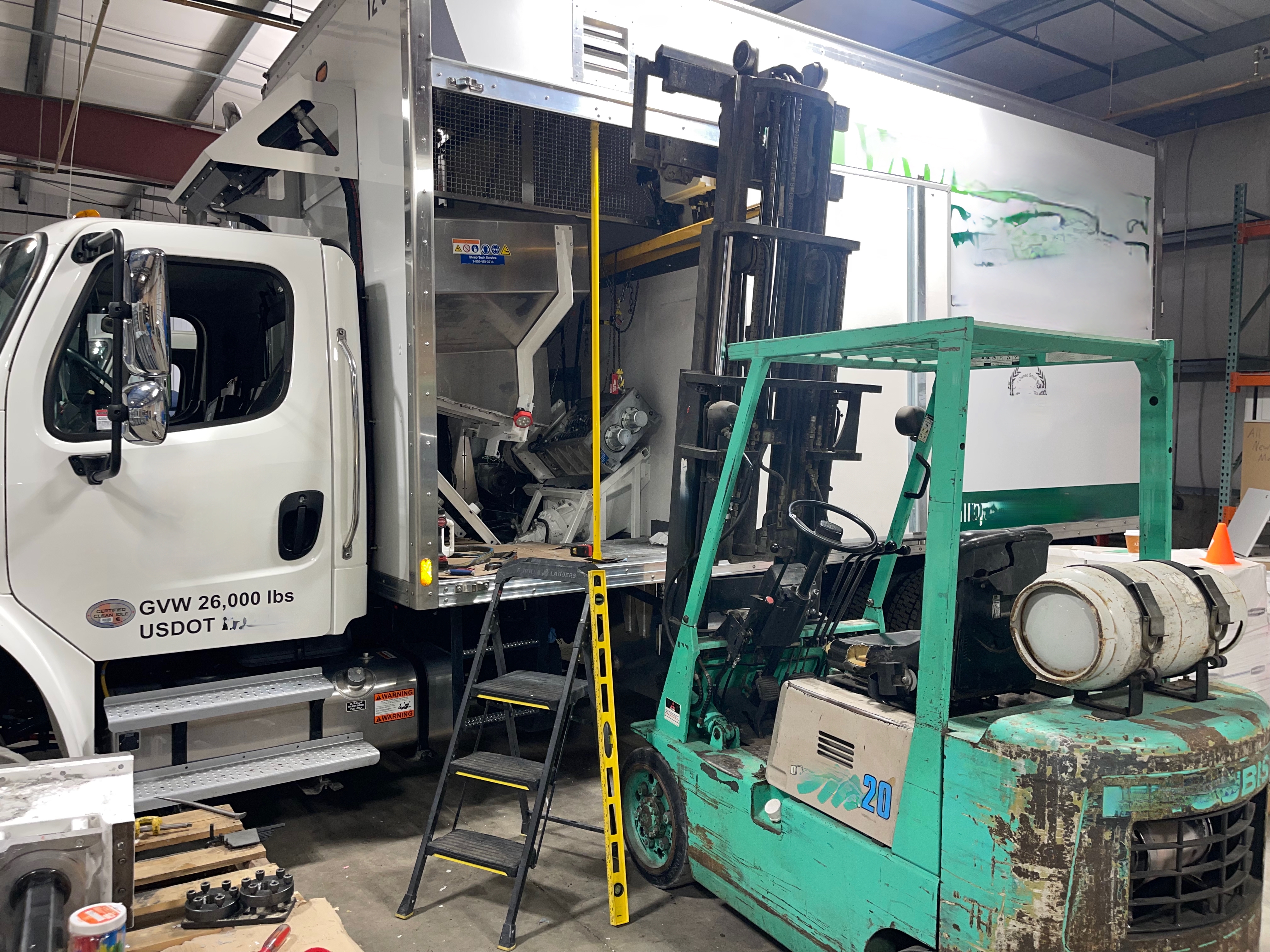 Shred truck teardown in shop